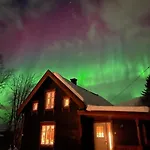 100 Years Old Norwegian Log House In Tromso