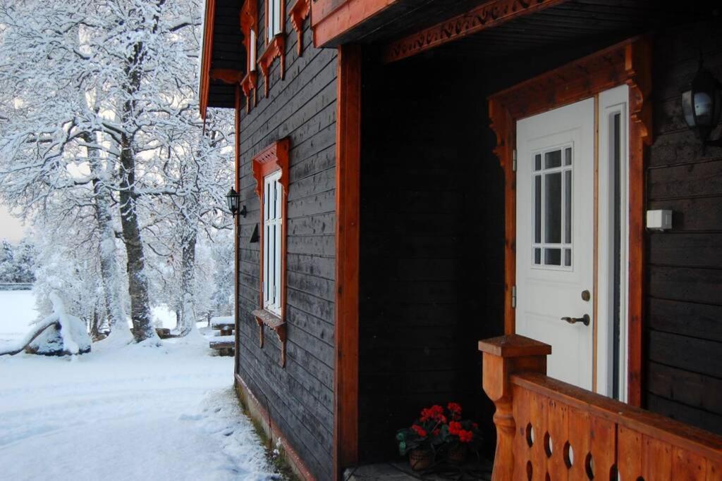 100 Years Old Norwegian Log House In Tromso